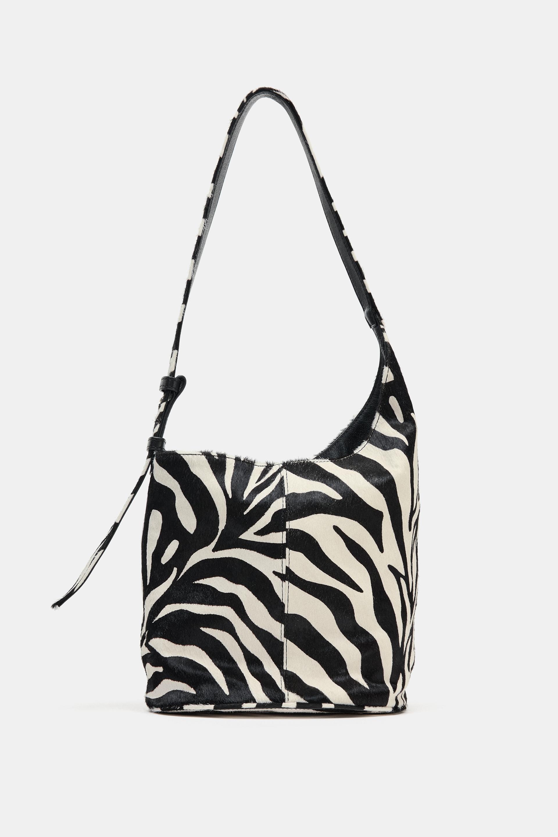 ASYMMETRIC SOFT LEATHER MINI BUCKET BAG